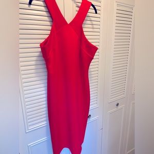 Jennifer Lopez Red knee length dress.